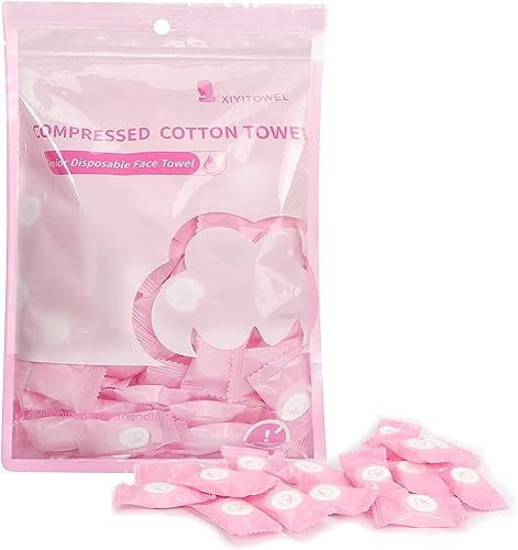 Classycoo 100-Pack Compressed Cotton Towels in Pink, showing mini tablets that expand into full-size towels when exposed to water, ideal for travel and outdoor activities