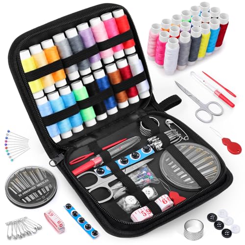 Portable sewing kit with heart-shaped black case, containing essential tools like thread, needles, scissors, and more, perfect for travel and quick repairs