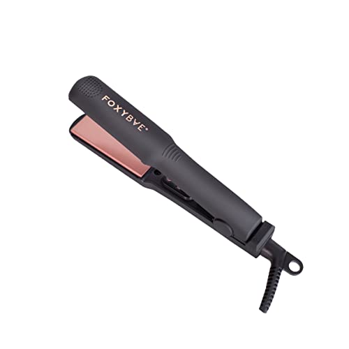 FoxyBae Mini Flat Iron in rose gold, a compact dual voltage hair straightener designed for travel, perfect for achieving sleek and frizz-free hairstyles on the go