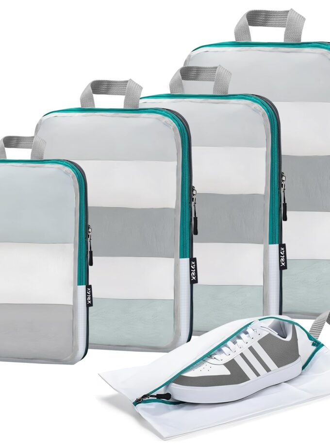 Set of green Compression Packing Cubes designed for efficient travel organization, featuring see-through mesh and various sizes for easy packing