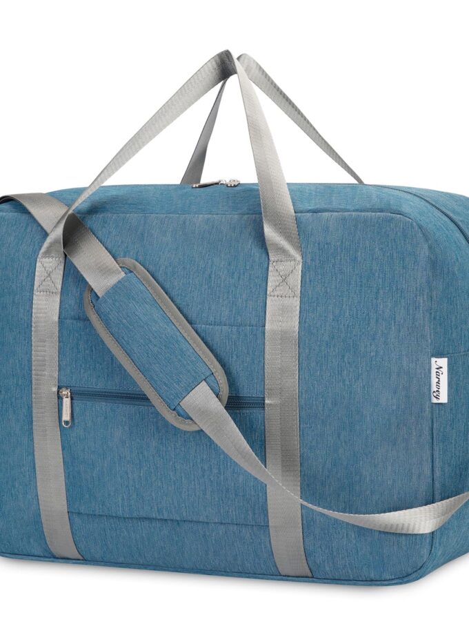 Navy blue foldable carry-on duffel bag with padded shoulder strap, fits under-seat storage and overhead bins