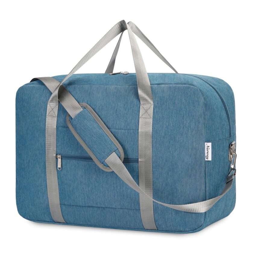 Navy blue foldable carry-on duffel bag with padded shoulder strap, fits under-seat storage and overhead bins