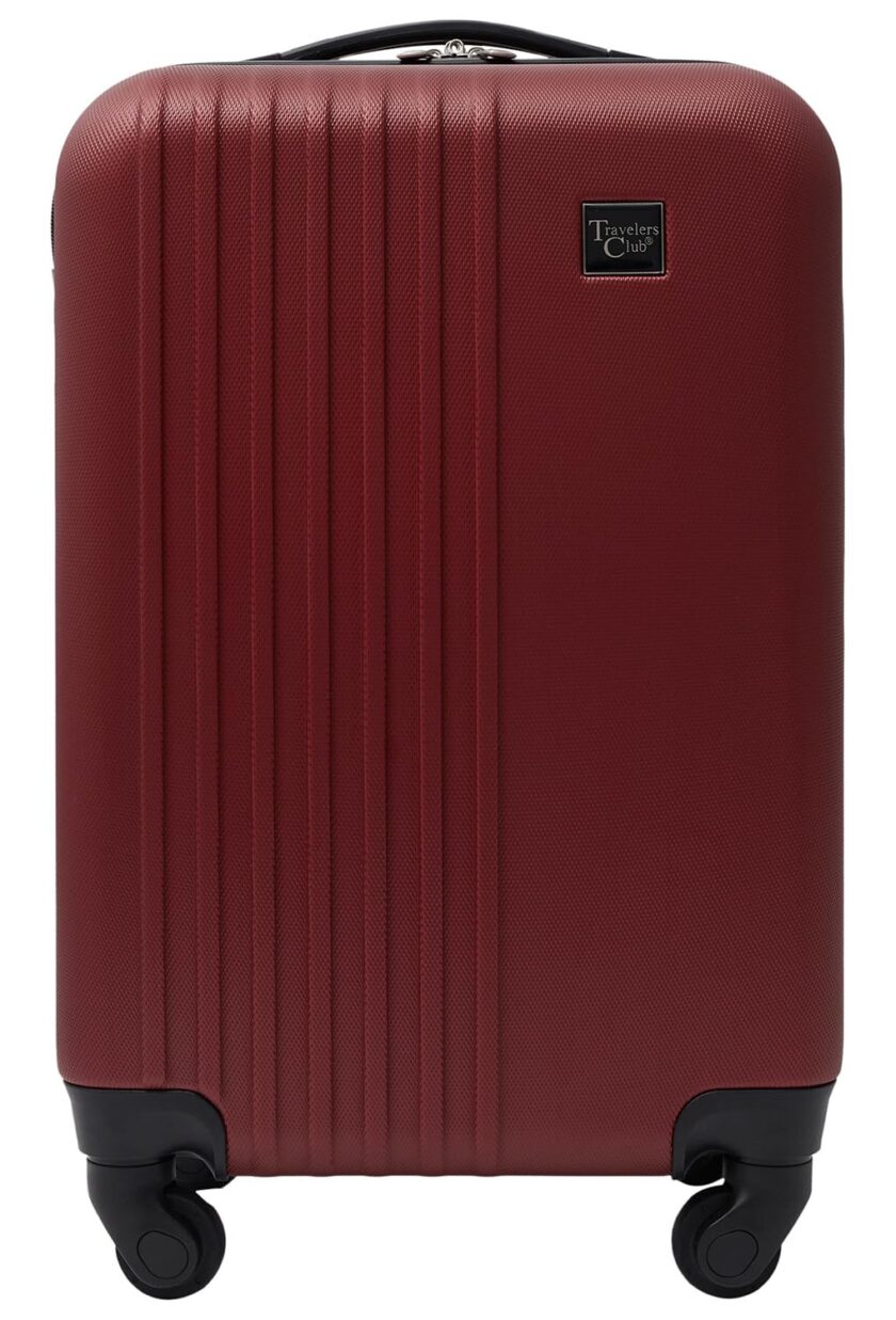 Travelers Club Cosmo Hardside Spinner Luggage in vibrant rhubarb red with 4 wheels for smooth travel.